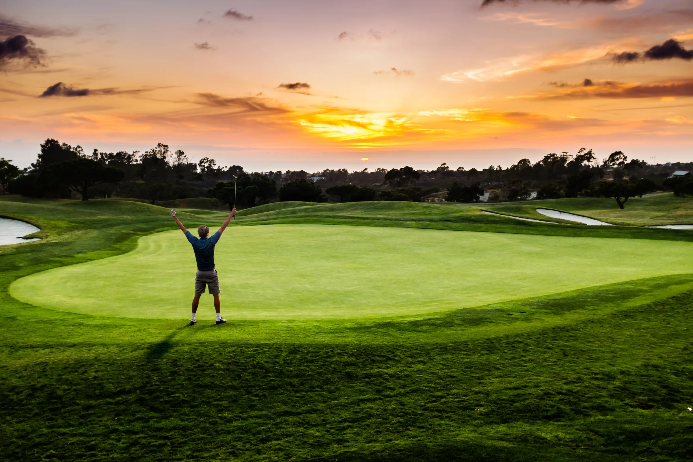 Golfer celebrates chipping in for eagle