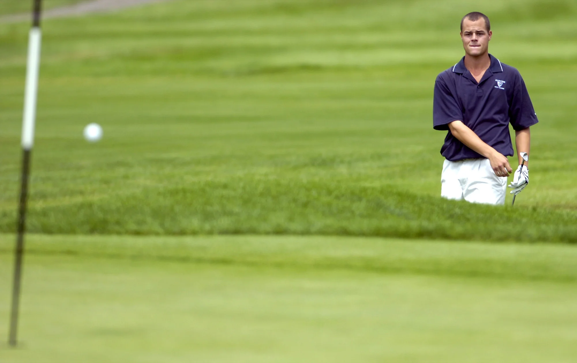 Ross McGee watches flop shot land near the flag