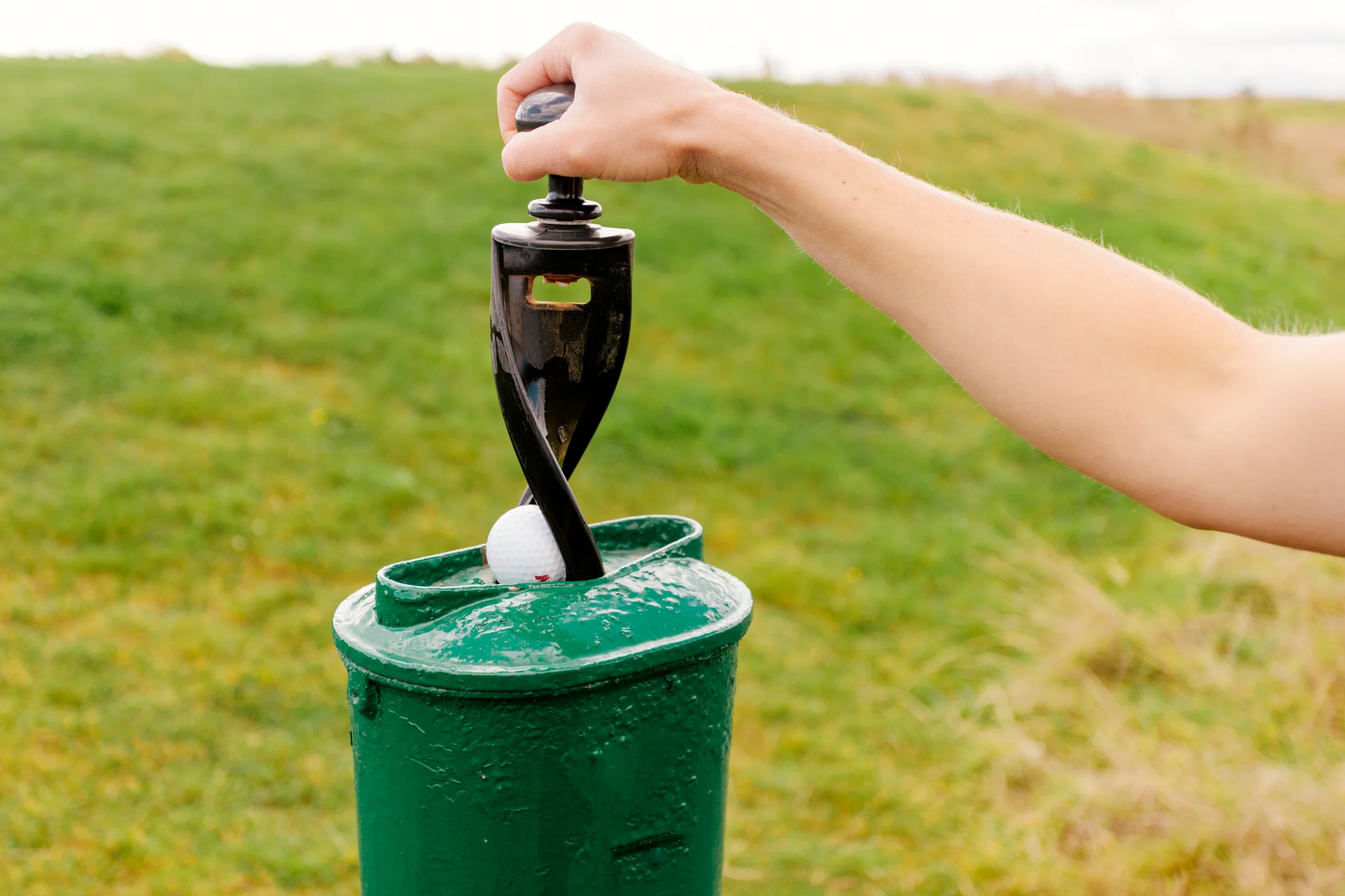 Traditional on-course golf ball washer