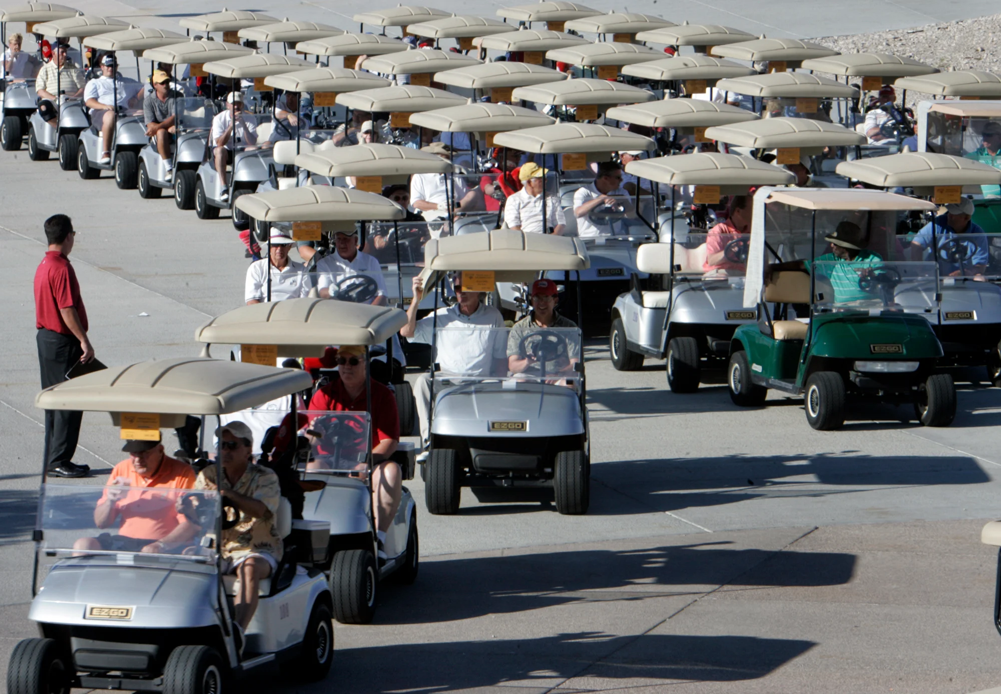 Golfers head to a shotgun start