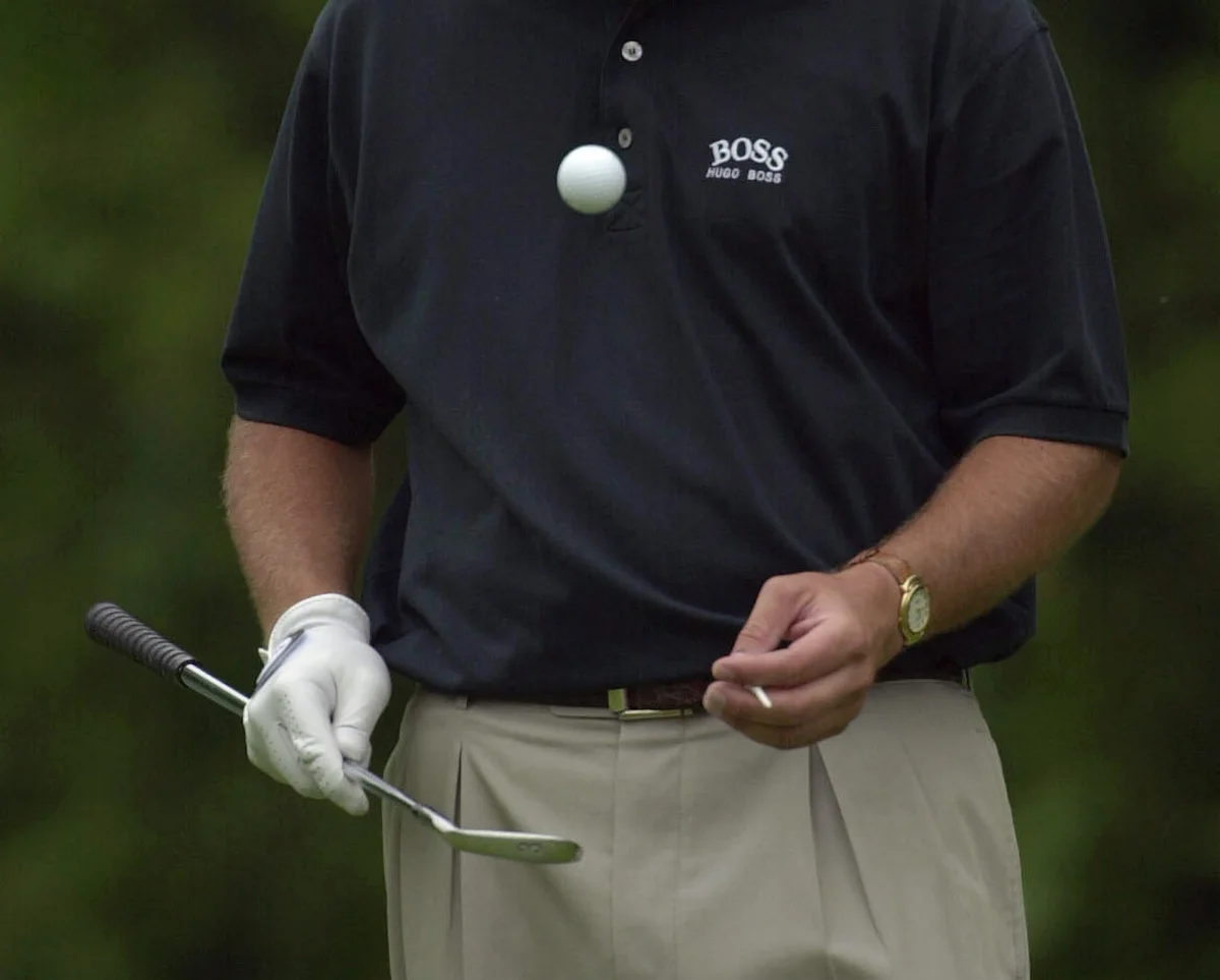 Phil Mickelson bounces ball on club