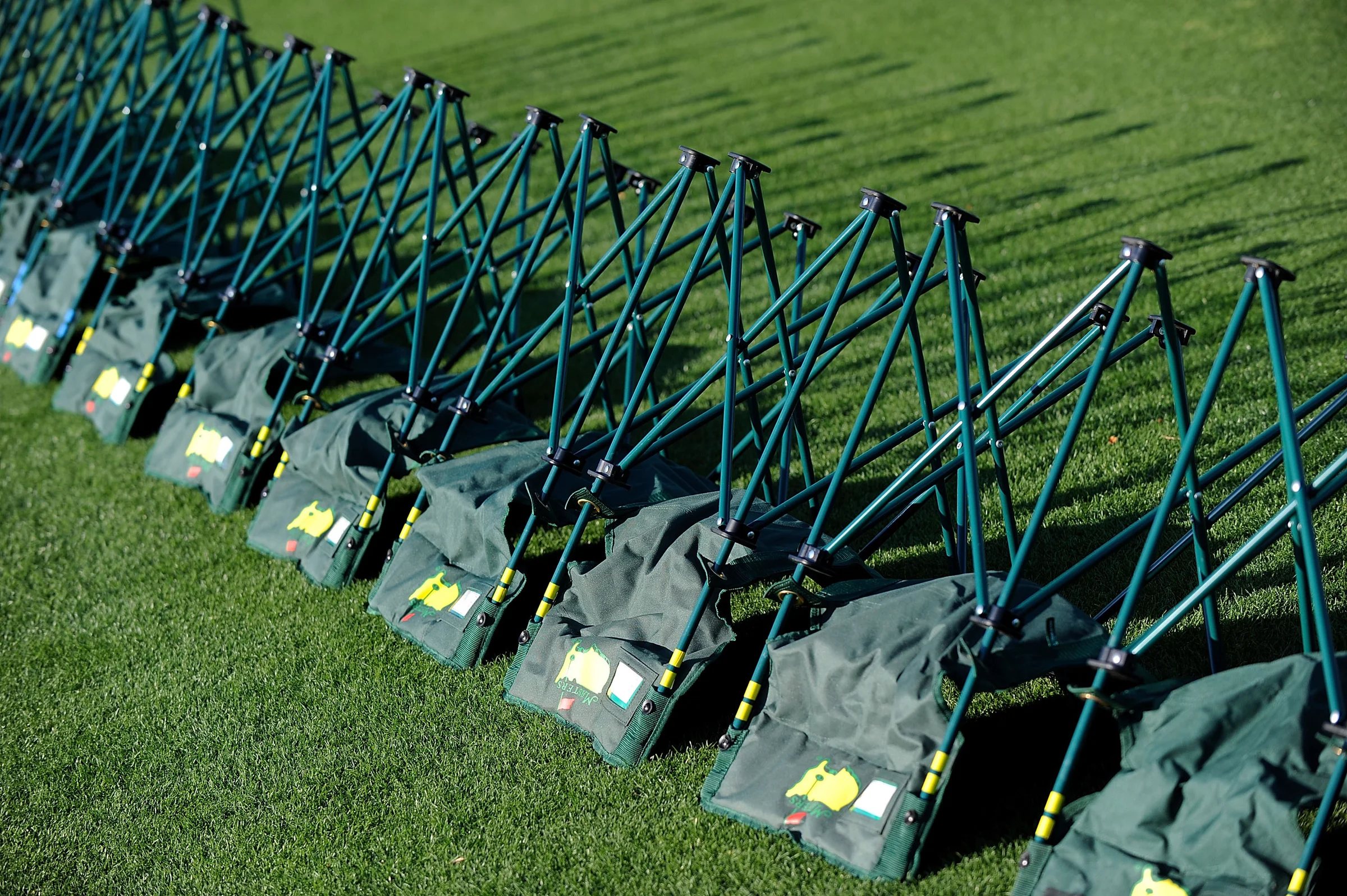 Armless green Masters chairs