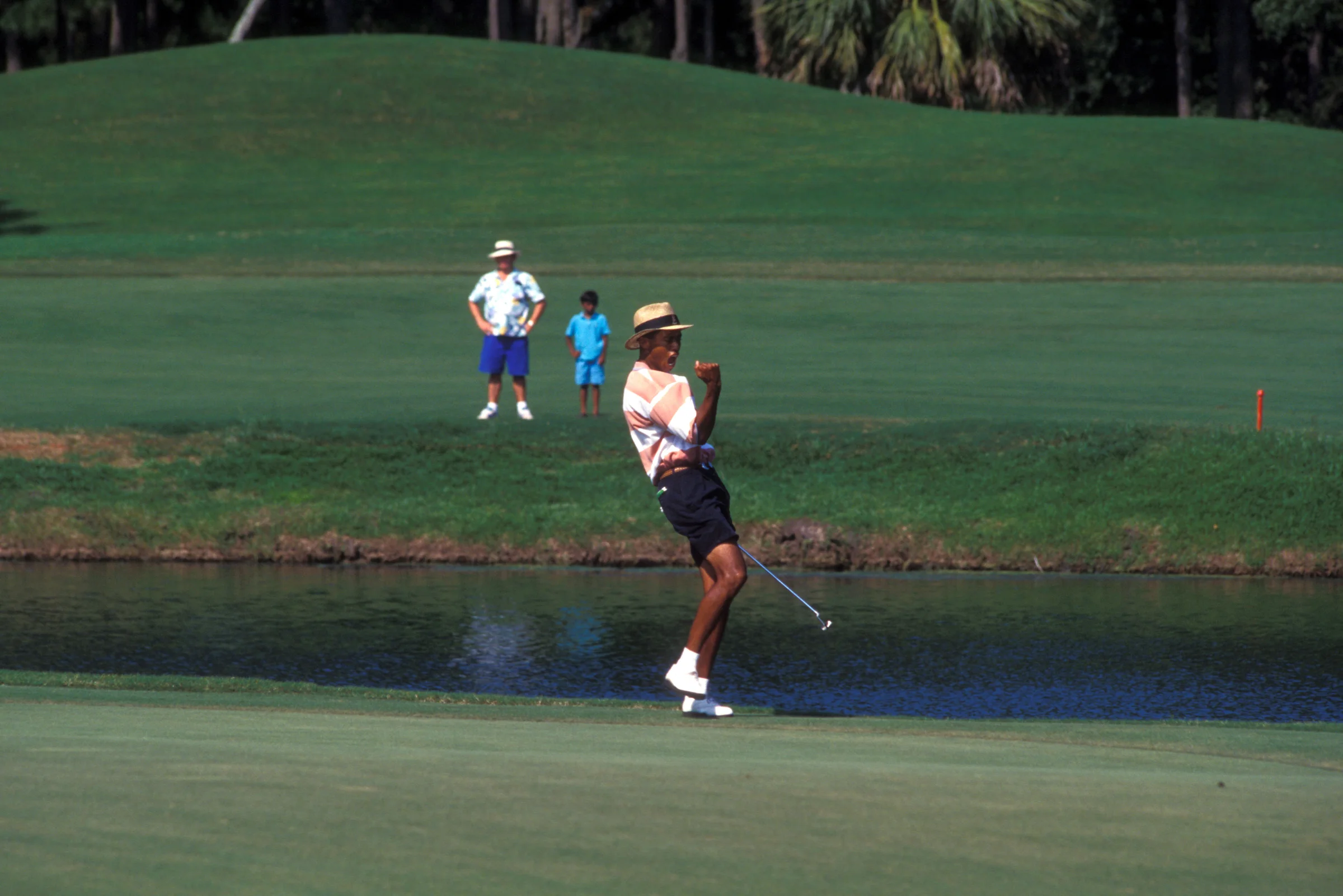 Tiger Woods celebrates during the 1996 US Amateur
