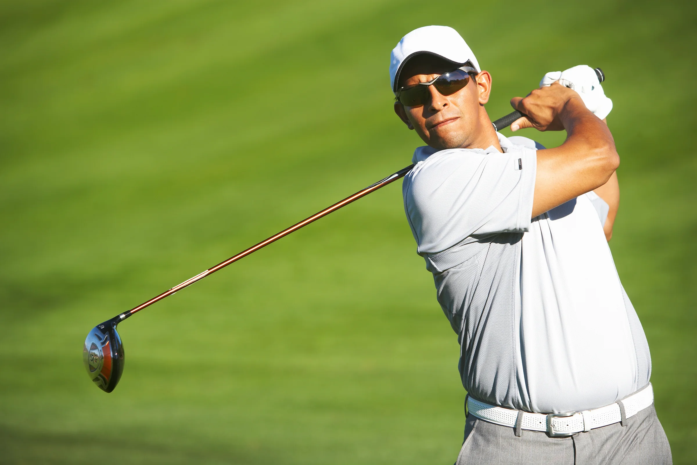 Golfer with a balanced follow through to his golf swing