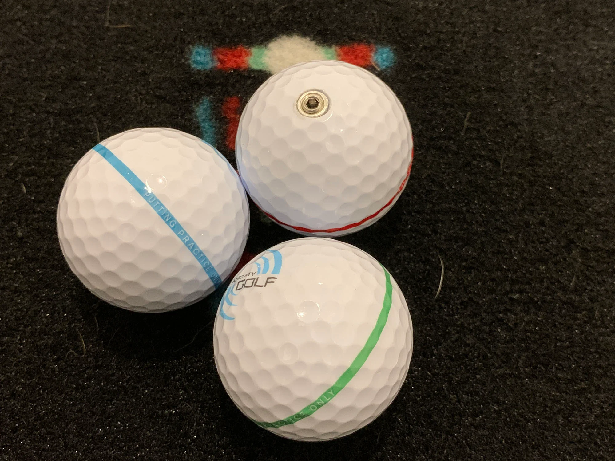 Weighted balls from Breaking Ball Putting Mat