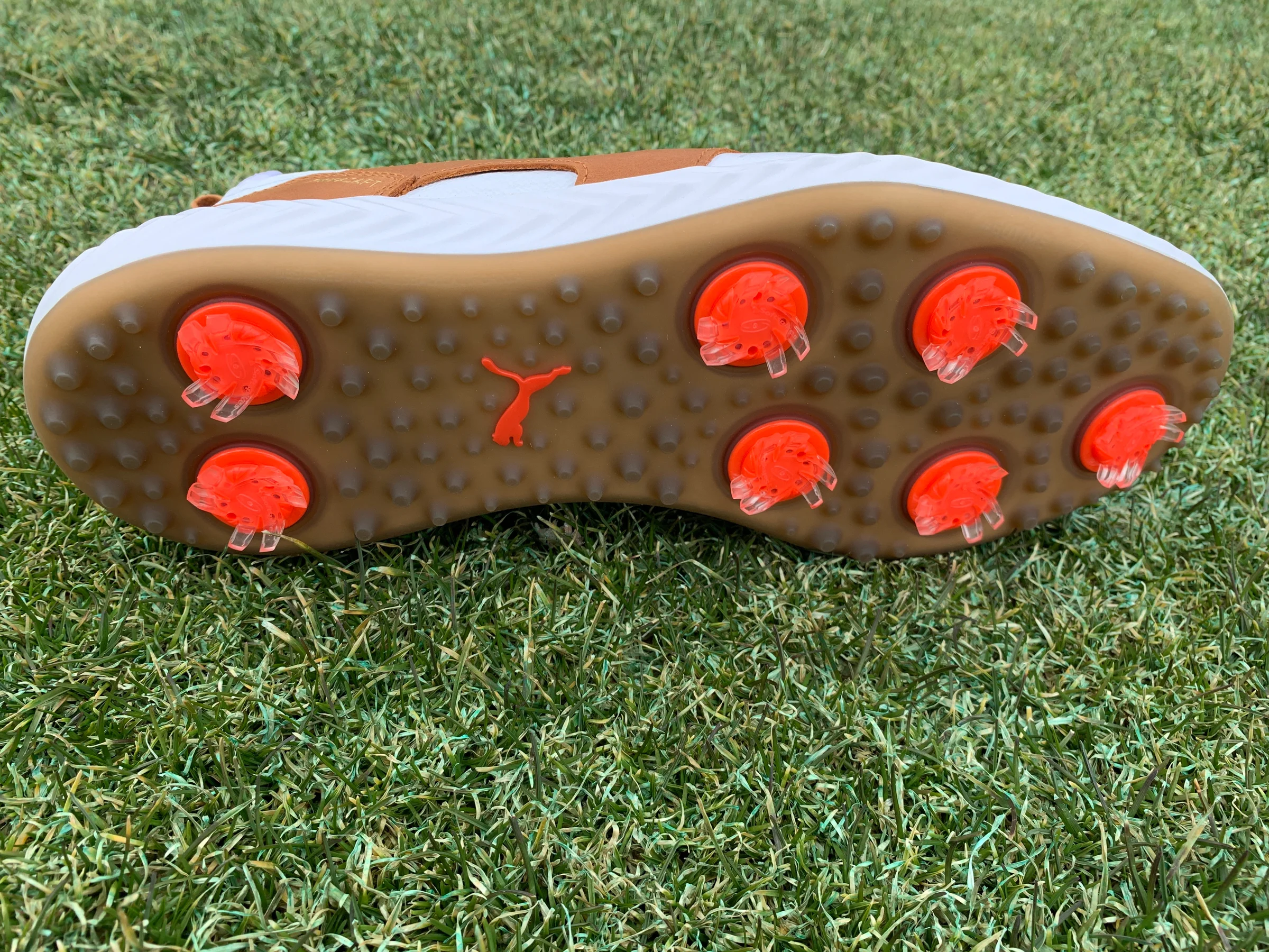 Sole of PUMA Ignite Pwradapt Caged Golf Shoes