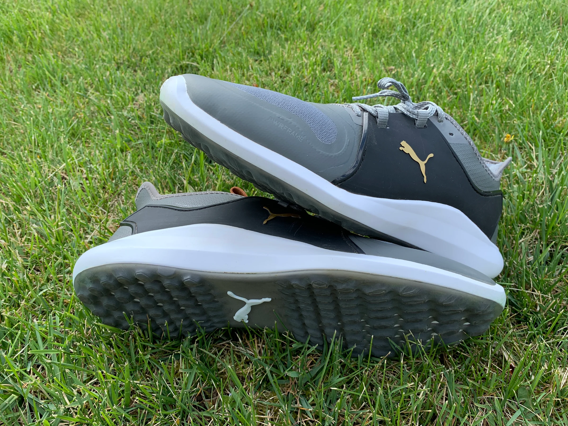 Spikeless bottom of PUMA Ignite Fasten8 golf shoe