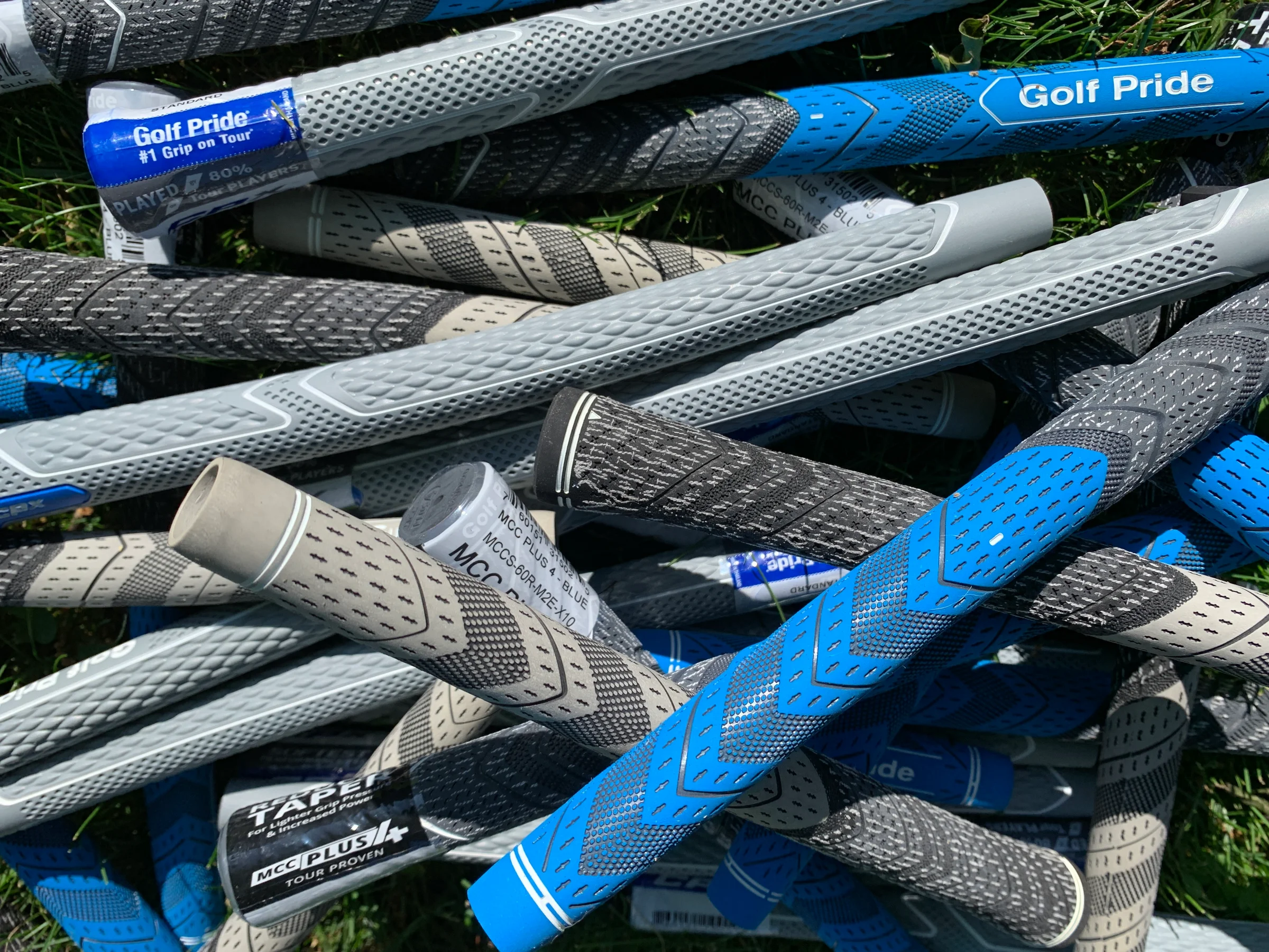 Pile of brand new golf grips