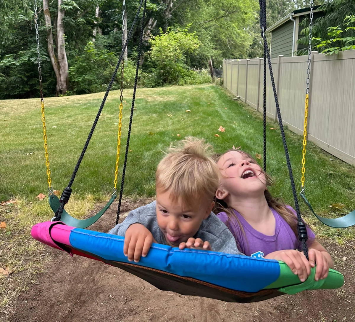 kids on PlayVibe swing