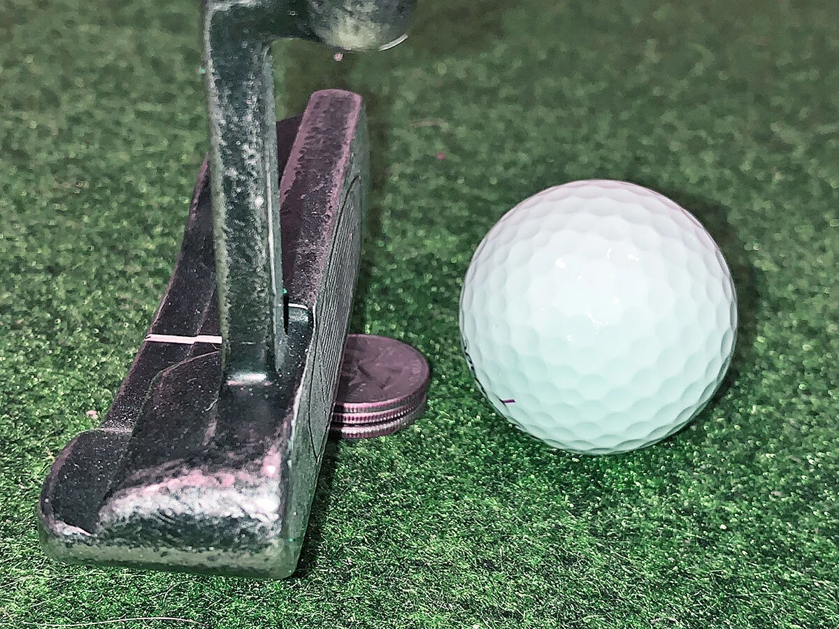 Putt with 3 quarters behind your ball for a perfect strike