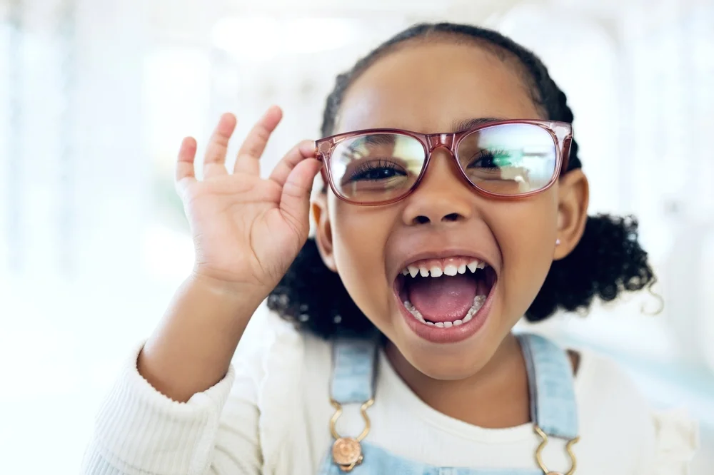 Cute little girl wearing glasses
