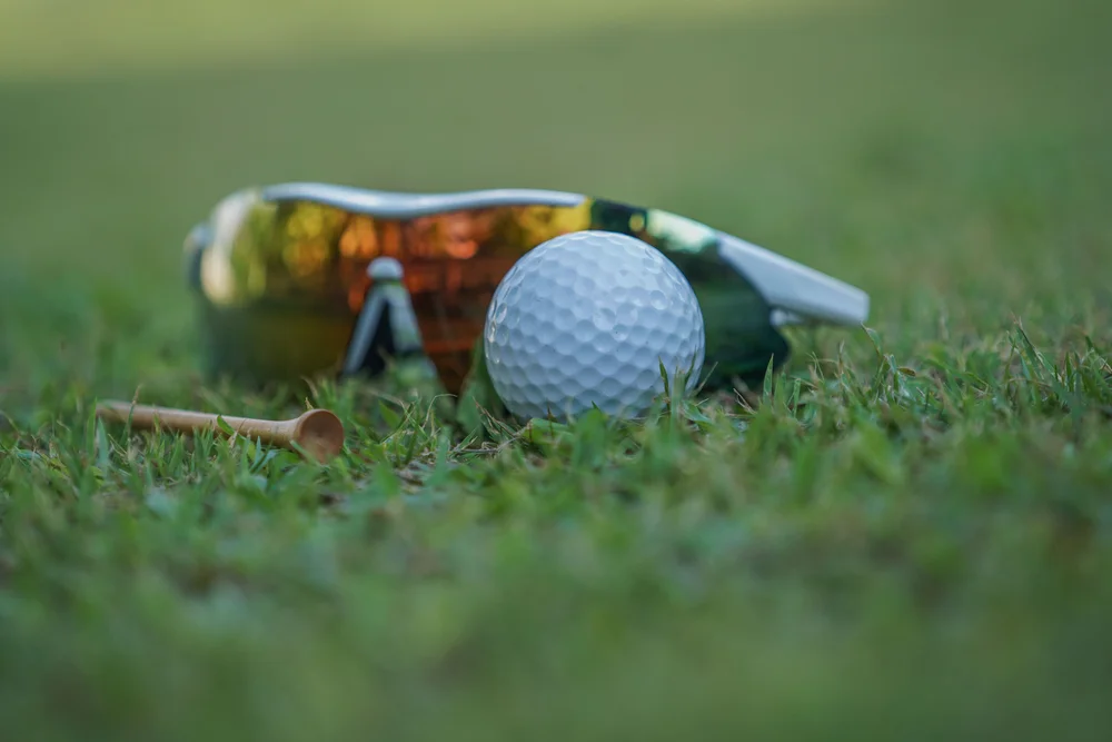 Sunglasses for golf on a golf course