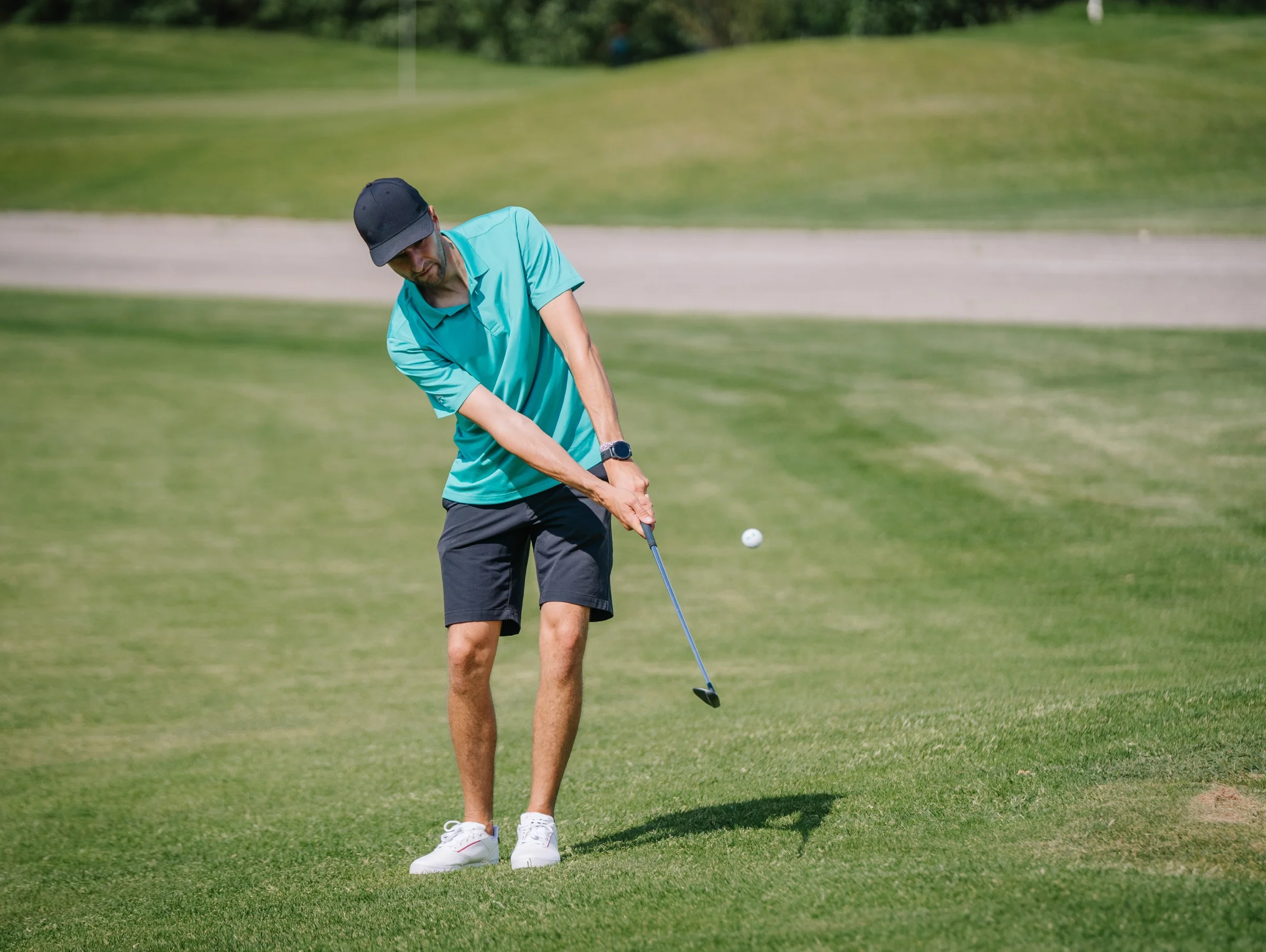 Golfer chipping from inside 50 yards