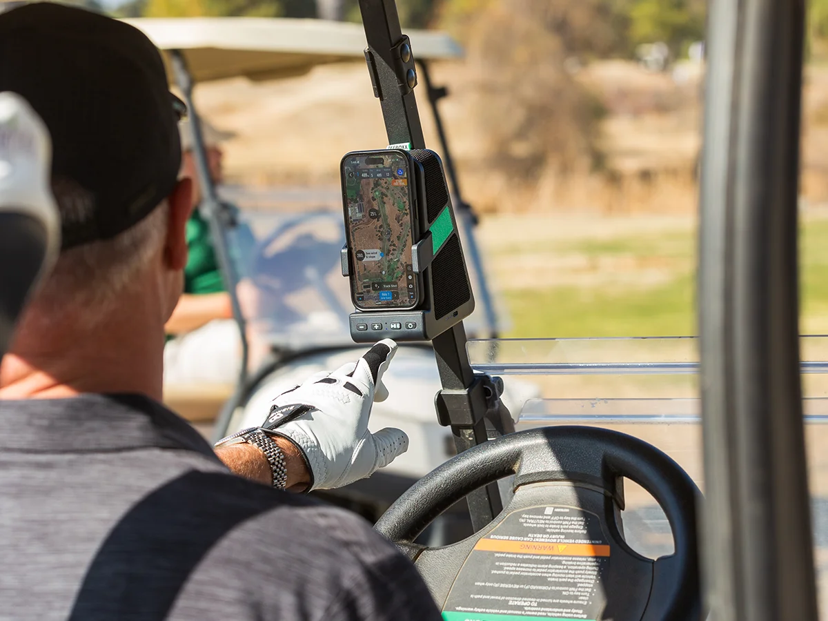 Golfer uses TeeBoxx to keep phone charged while using GPS maps and playing music